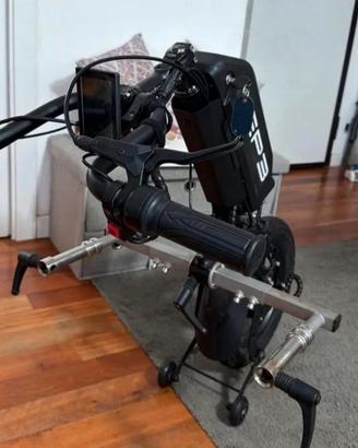 Kit di motorizzazione per carrozzina