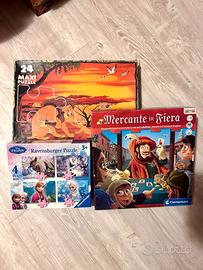 Gioco Mercante in fiera e 2 Puzzle Frozen Re Leone