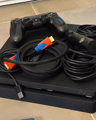 PlayStation 4 slim + accessori + giochi