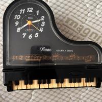 Orologio/ svaglia a pianoforte
