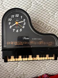 Orologio/ svaglia a pianoforte