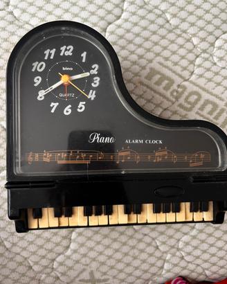 Orologio/ svaglia a pianoforte