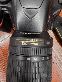 Nikon D5600 + Nikkor 18-105 VR + Accessori