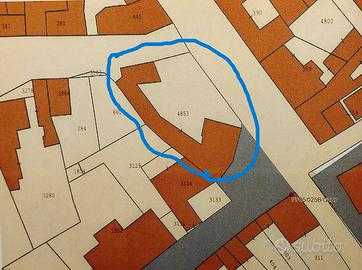 Lotto di terreno con casa