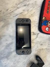 Nintendo Switch + 6 giochi + Ring Fit Adventure