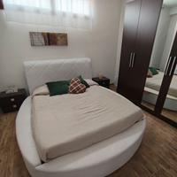 letto tondo e armadi