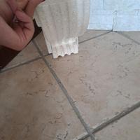 Mensola angolare in pietra con tavolino in vetro