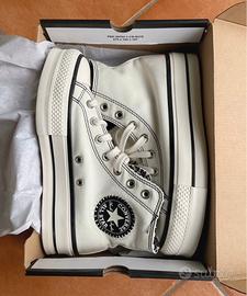 Converse bianche e outlet nere