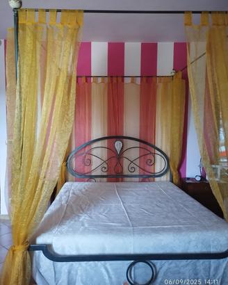 Letto baldacchino