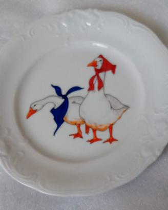 Piatto con oche in ceramica