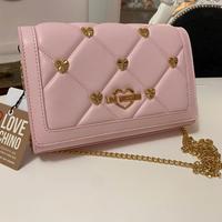 Borsa rosa Moschino con tracolla e dettagli oro