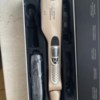 Piastra per capelli a vapore