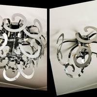 Lampadari moderni in acciaio