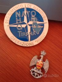 medaglione nato e porta binocolo