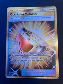 carta pokemon occhiali metallici