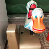 Giostrina dondolante con gettoniera