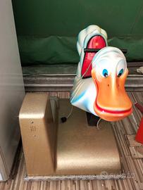 Giostrina dondolante con gettoniera