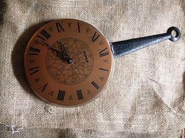 orologio da parete in rame