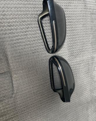Calotte compresse di frecce dinamiche nero lucido