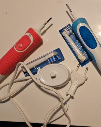 coppia spazzolini elettrici Braun più  2 testine