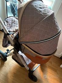Passeggino cachi neonati nuovo