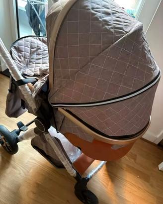 Passeggino cachi neonati nuovo