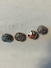 Clip e charm Pandora. CAD €55