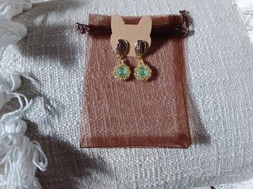 orecchini fatti a mano con rivoli e perline. nuovi