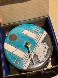 Orologio da parete con pendolo in ceramica Raku