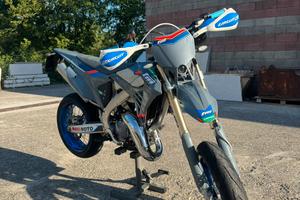 TM 125 2026