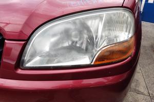 Proiettore sinistro SUZUKI IGNIS del 2002