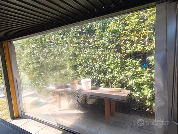 Tenda a rullo per esterno in PVC trasparente