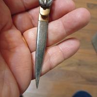 ferma soldi in argento e bronzo vintage.
