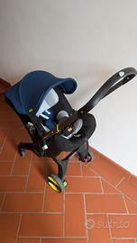 Doona ovetto pieghevole seggiolino auto con ruote
