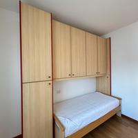 Armadio a ponte con letto
