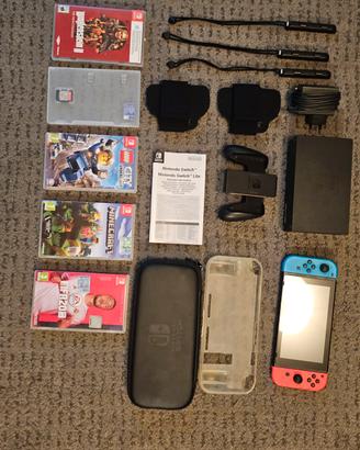 nintendo switch con giochi e accessori