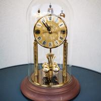 orologio in campana di vetro 