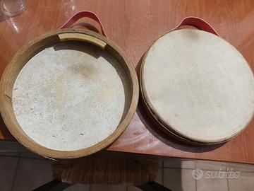 Gioco vintage tamburelli in cuoio e legno e pallin