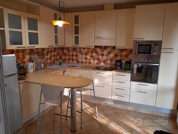 Appartamento su 2 livelli con posto auto numerato