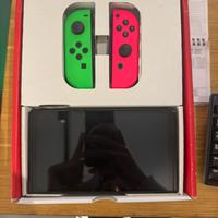 Nintendo Switch OLED – Joy-Con Verde & Rosa |