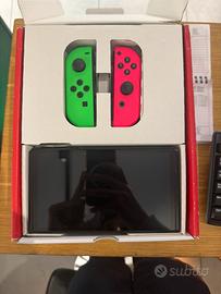 Nintendo Switch OLED – Joy-Con Verde & Rosa |