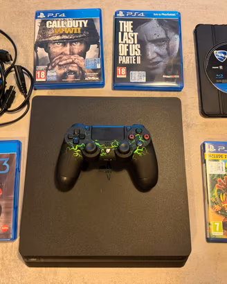 Sony PS4 Slim + Controller, cavi e 5 giochi