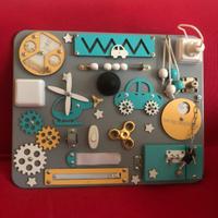 Busy board Pannello sensoriale Montessori in legno