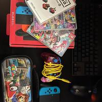 Nintendo switch oled +4 giochi e accessori