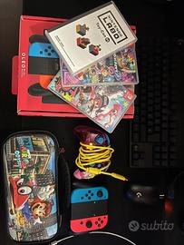 Nintendo switch oled +4 giochi e accessori