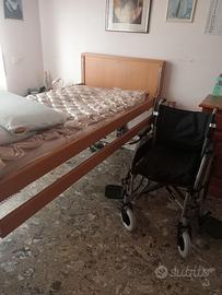 Letto x disabili più sedia a rotelle più materasso