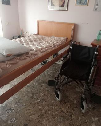 Letto x disabili più sedia a rotelle più materasso