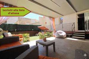 Appartamento Ristrutturato con Giardino e Garage