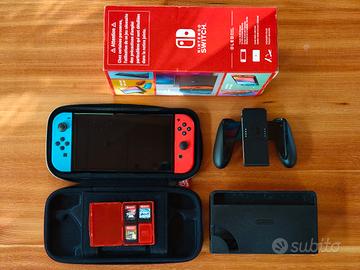 Nintendo Switch (OLED) + 3 giochi + custodia