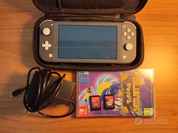 Nintendo switch lite e due giochi Pokemon